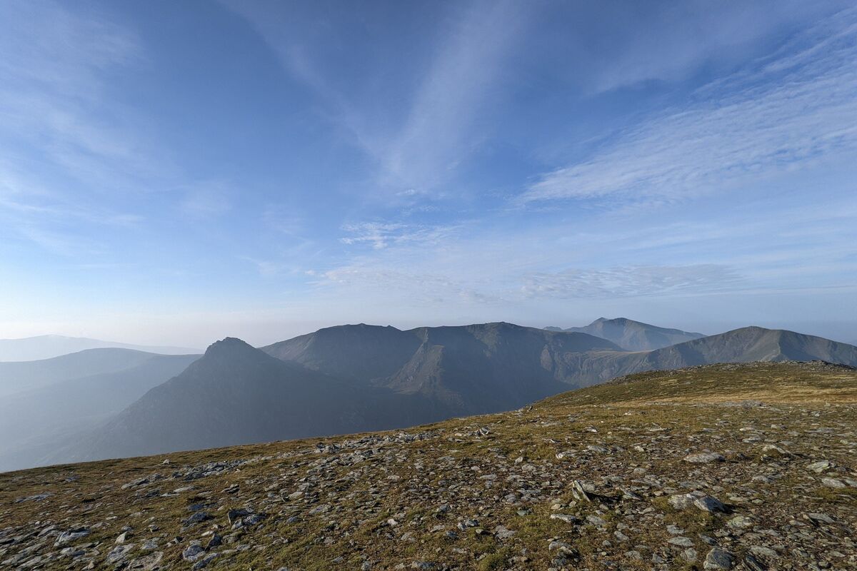 The mountains of Tryfan and the Glyderau with Snowdon in the background