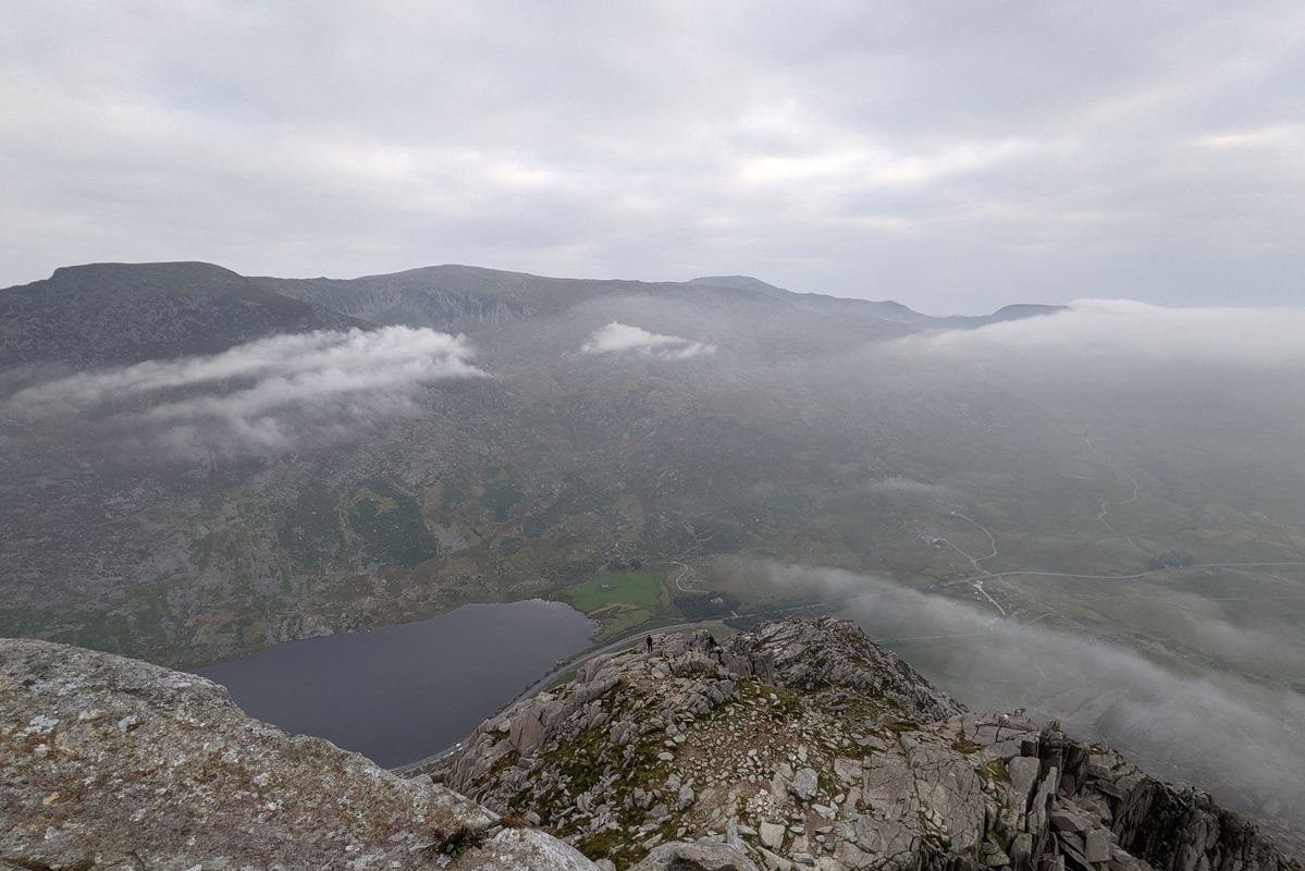 A view from high up looking down at Llyn Ogwen and Ogwen valley